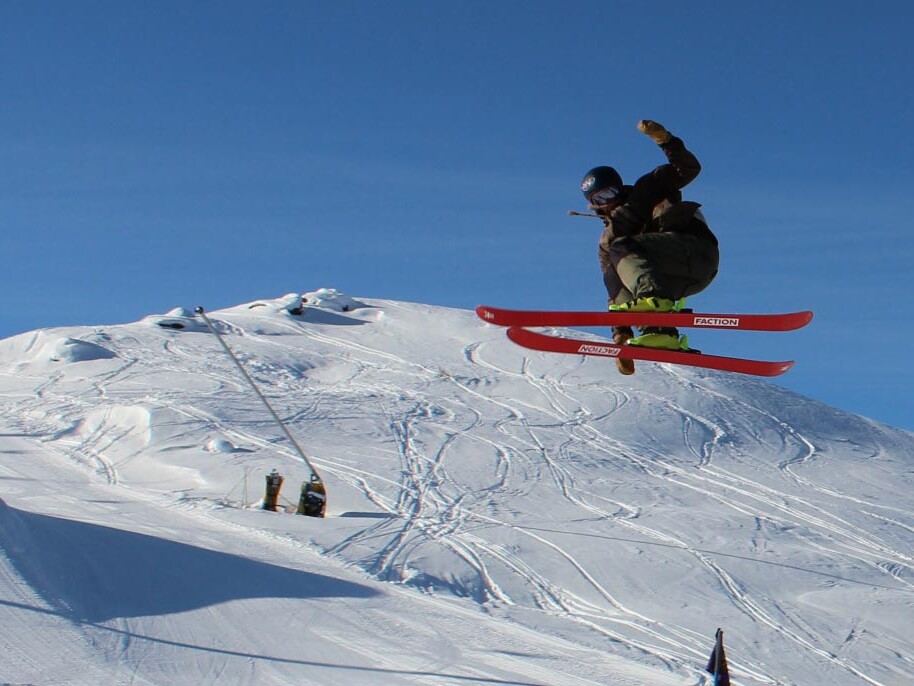 SVSEF Freeskier no-pole-ian 540 air off slopestyle jump.