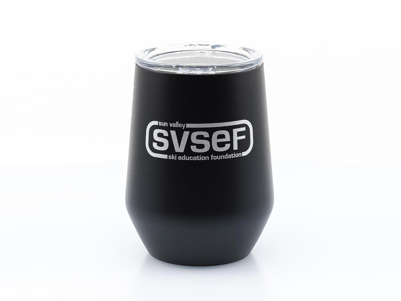 front view a black tumbler mug with the SVSEF logo on it